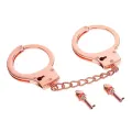 Roségoldene Handschellen mit Totenkopfschlüsseln von Latetobed BDSM Line