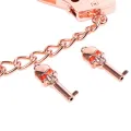 Roségoldene Handschellen mit Totenkopfschlüsseln von Latetobed BDSM Line