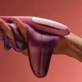 Dot Travel Klitoris-Stimulator Lila von Lelo | Fesselliebe.de